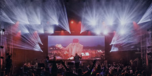 Concert stage with large lighting show, LED screen and orchestra
