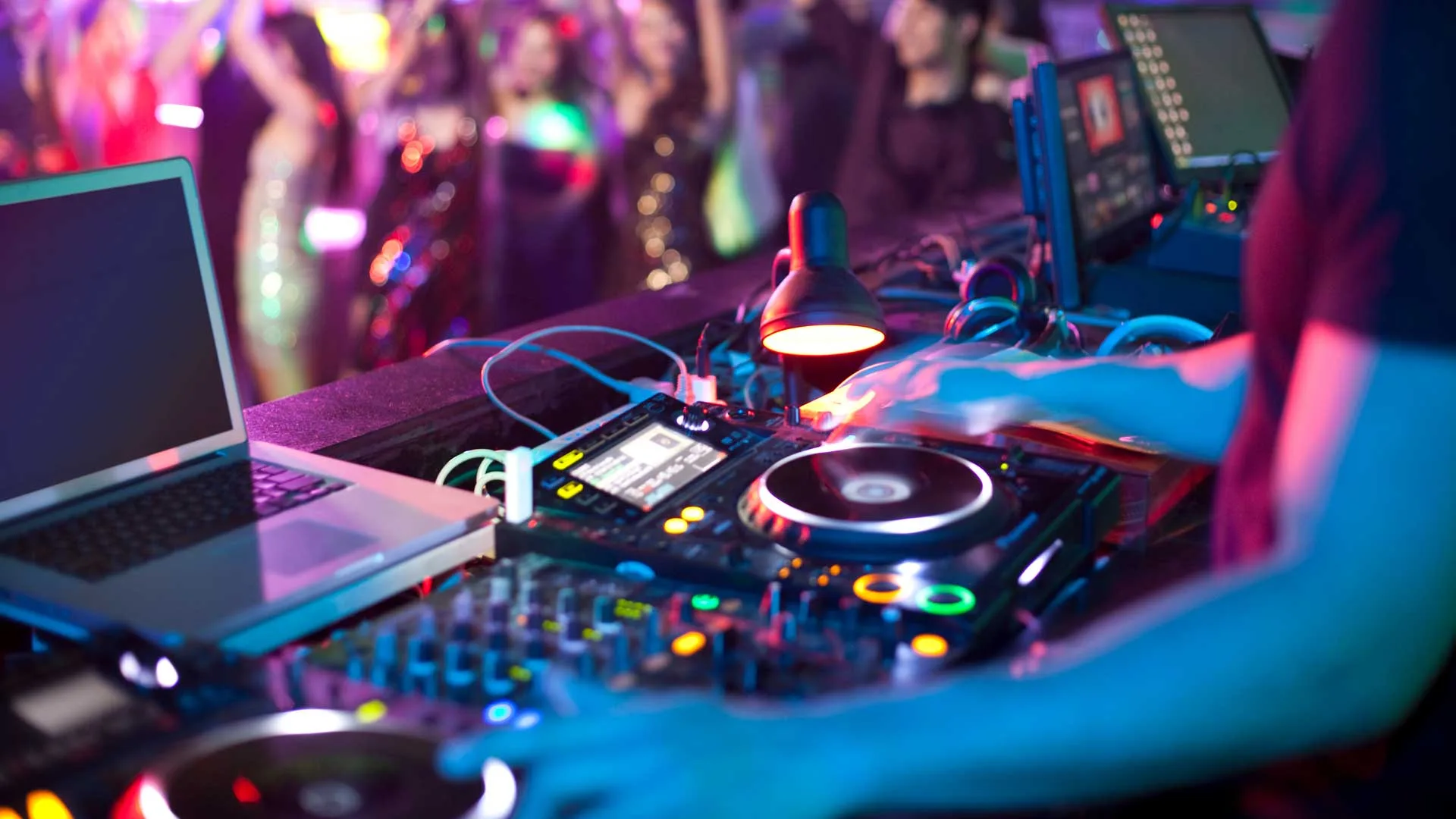 DJ Equipment being used by a DJ in a nightclub booth