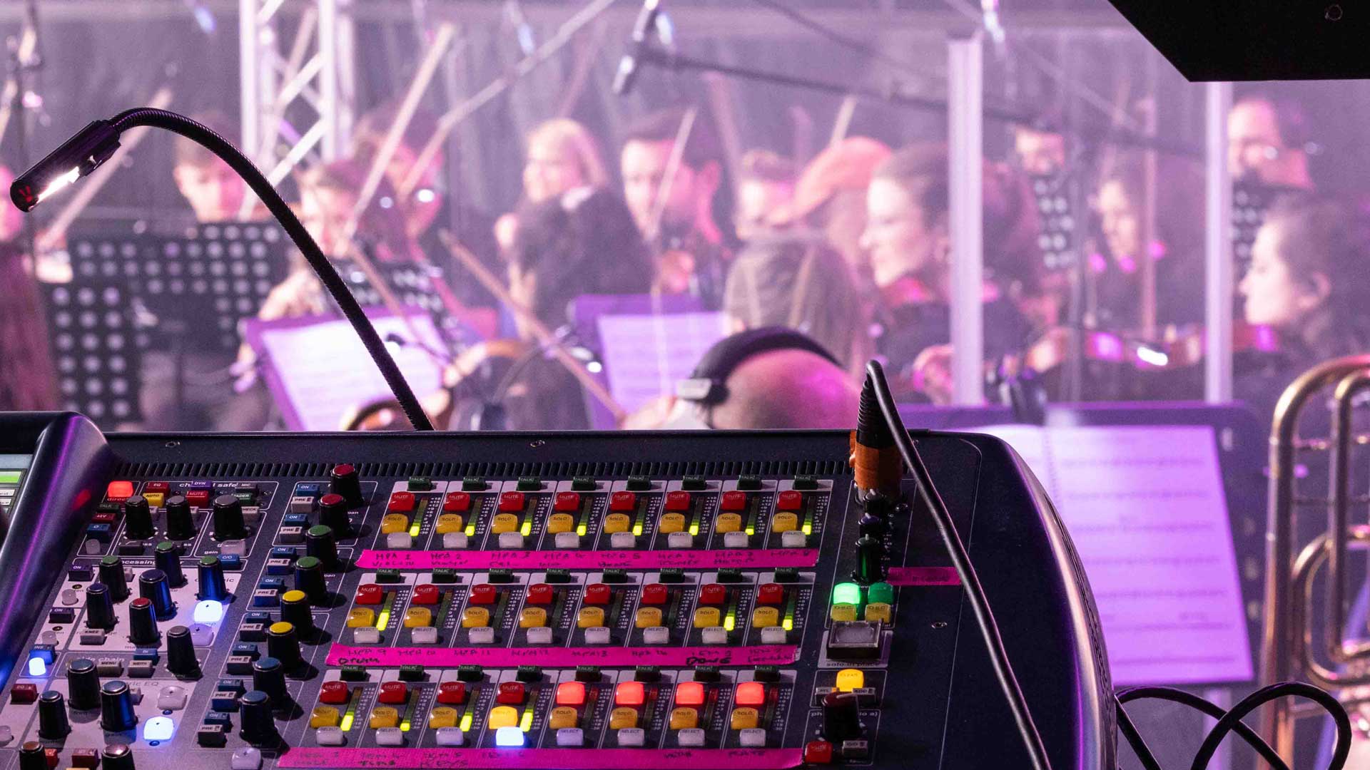 Monitor Mixer looking over the stage with orchestra with 24 monitor mixes