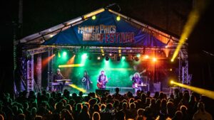 Farmer Phils Festival Main Stage with crowd watching a band peform