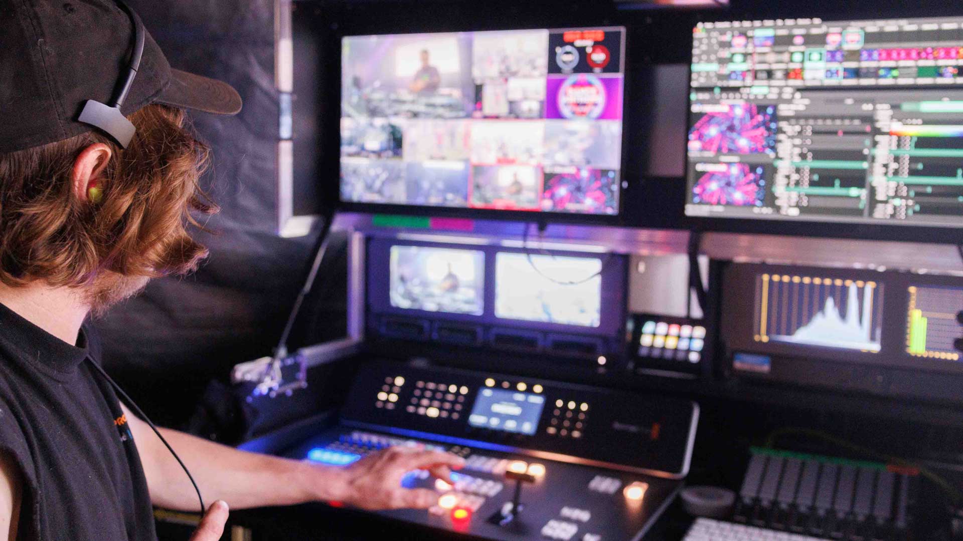 Video technician operating video switching equipment