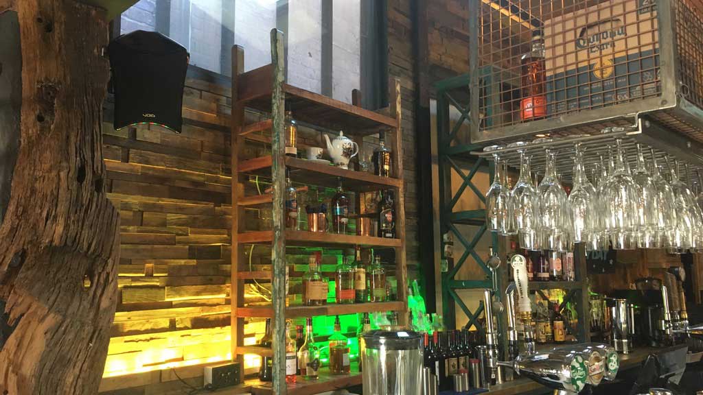 Speaker installed in bar as part of whole AV system