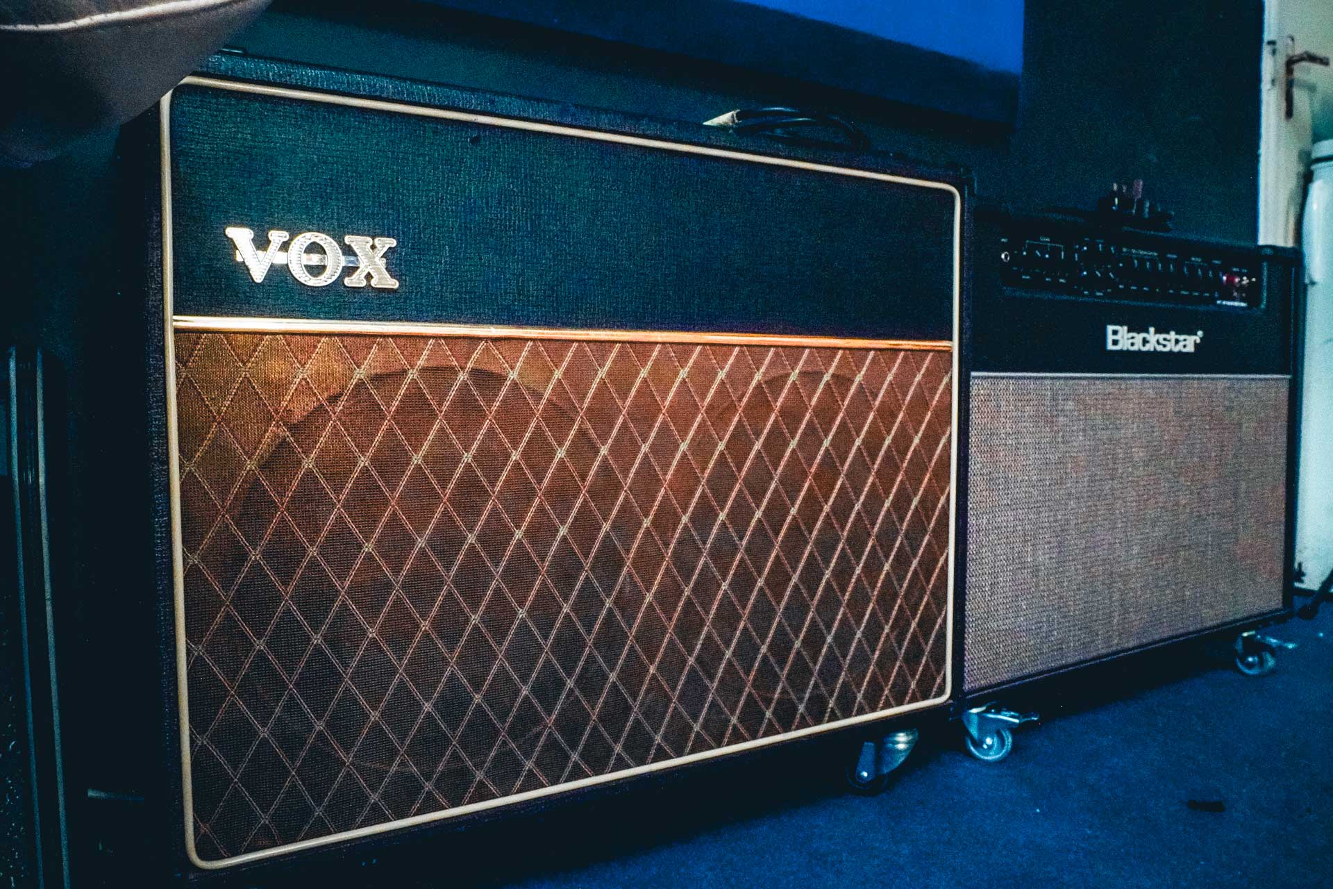 Two guitar amplifiers side by side. One VOX and the other Blackstar