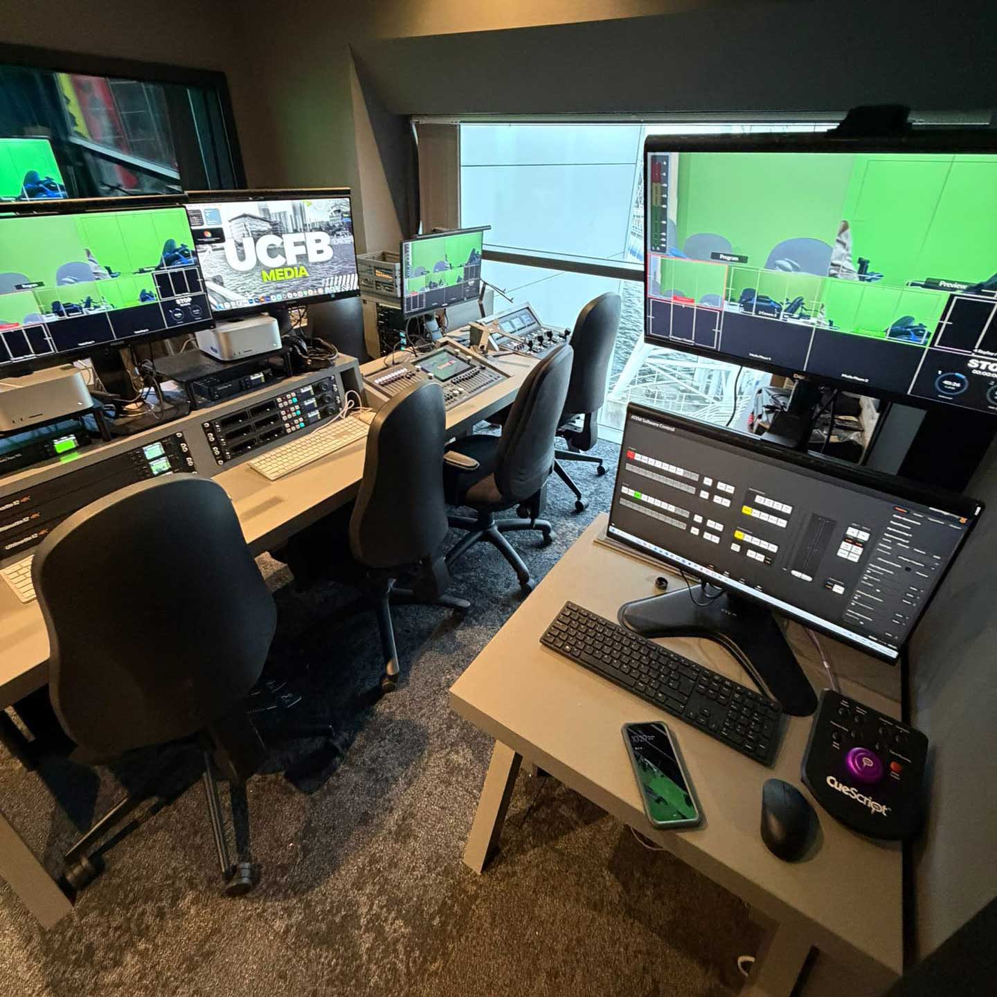 Vision mixing suite with various work stations with vision mixing and control stations with computer screens