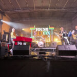 Band playing on stage at Ashfest 2026, the community day festival for The White Lion pub, with PA hire from Pro Audio Services